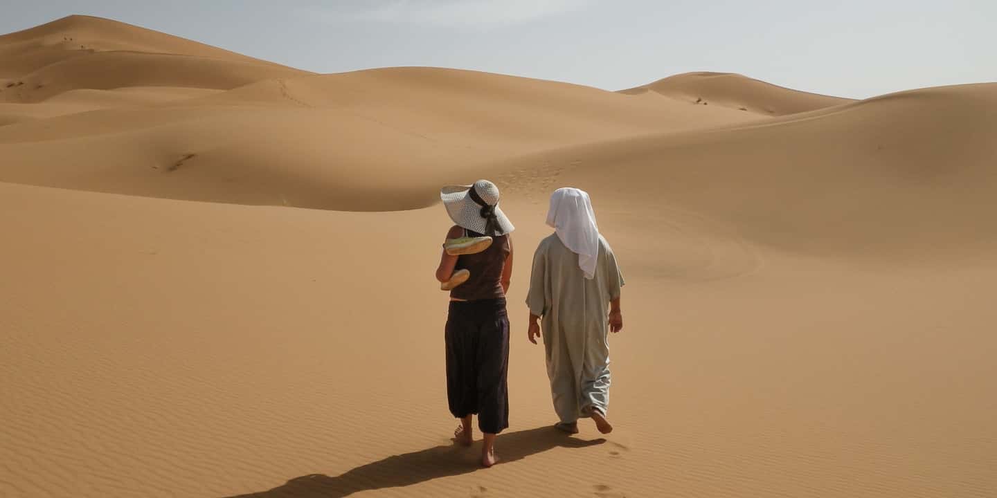 Walking through the desert in Morocco