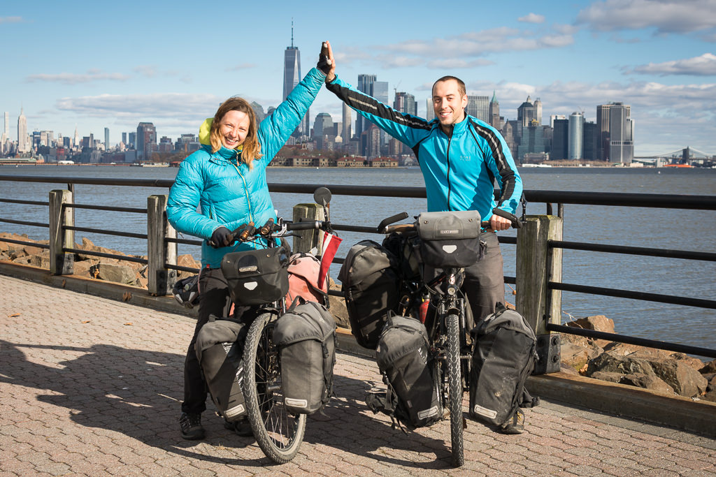 High five! NYC end of world round trip by bicycle